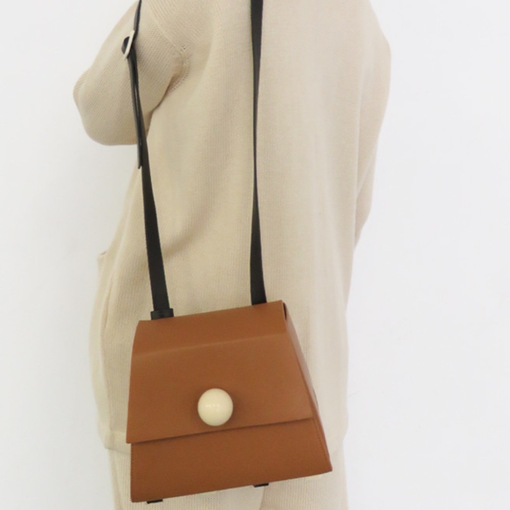 MATTER MATTERS GALLERY
MINI TRAPEZOID SHOULD BAG - BROWN Leather Crossbody Bag - Picture 2 of 16